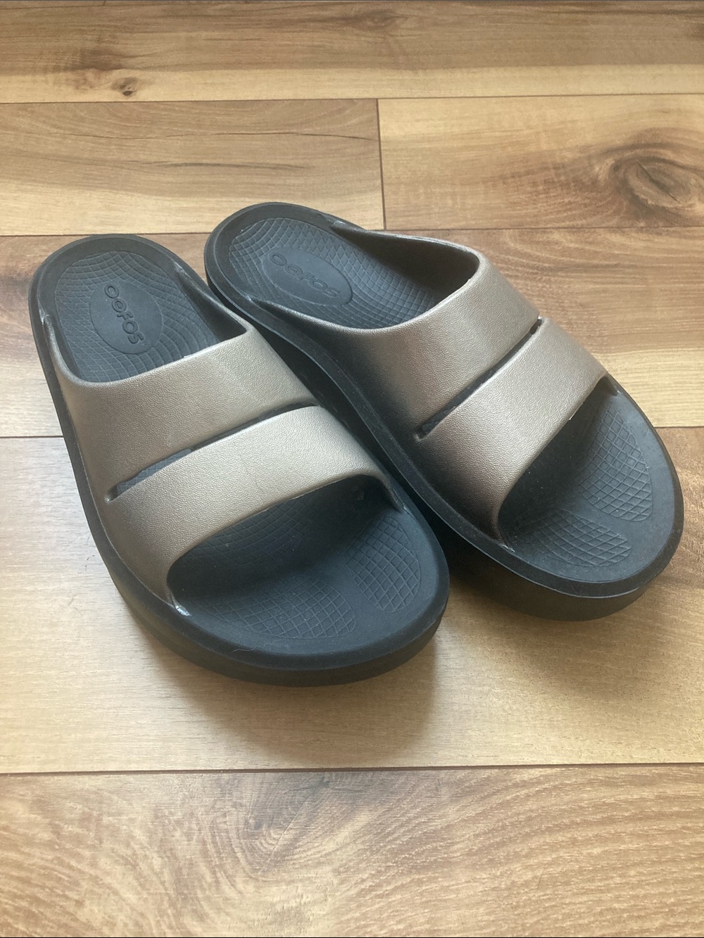 OOFOS OOahh Bronze Colored Sandals